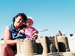 Mommy, Hannah, and the sandcastle
